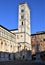 Sunlit side and bell tower of the large church dedicated to San Michele in Foro in Lucca.