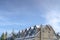 Sunlit snowy building against sky in Park City