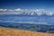 Sunlit snowy Tatra peaks and green forests in spring Slovakia