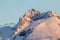 Sunlit Triglav peak from Bohinj valley, early morning