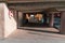 Sunlit under bridge view with stone columns