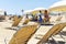 Sunloungers and umbrellas in a beach