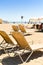 Sunloungers and umbrellas in a beach