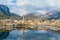 Sunny aerial cityscape of Lecco town on spring day. Picturesque waterfront of Lecco town located between famous Lake Como and