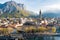 Sunny aerial cityscape of Lecco town on spring morning. Picturesque waterfront of Lecco town located between famous Lake Como and