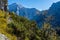 Sunny autumn alpine scene. Peaceful rocky mountain view from hiking path near Almsee lake, Upper Austria