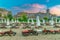 Sunny Beach, Bulgaria - 4 Sep 2018: Umbrellas and chair lounges at sunrise in Sunny Beach, a major seaside resort on the Black Sea