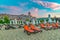 Sunny Beach, Bulgaria - 4 Sep 2018: Umbrellas and chair lounges at sunrise in Sunny Beach, a major seaside resort on the Black Sea