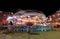 SUNNY BEACH, BULGARIA - September 10, 2017: Attraction in the park. Carousel in motion at night. A long exposure photo