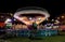 SUNNY BEACH, BULGARIA - September 10, 2017: Attraction in the park. Carousel in motion at night. A long exposure photo