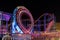 SUNNY BEACH, BULGARIA - September 10, 2017: Attraction in the park. Roller coaster in motion at night. A long exposure photo