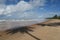 Sunny beach day and a diagonal palm tree shade on the tropical beach of Barra Grande, Marau Peninsula, Bahia State, Brazil