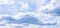 Sunny blue sky background with clouds. Blue sky background with fluffy huge clouds.