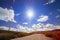 sunny blue sky on a windmill field in Spain