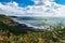 Sunny coast line cliff top view.