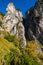 Sunny colorful autumn alpine scene. Peaceful rocky mountain view from hiking path near Almsee lake, Upper Austria