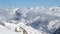 Sunny Day Above Low Clouds in Winter Snowy Alps Mountains Time Lapse