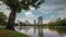 Sunny day bangkok lumpini park pond panorama 4k time lapse thailand