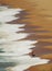 Sunny day at the beach. Voluminous waves drawing the sand of the orange beach forming a beautiful backdrop and texture. Featured,