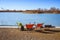 Sunny day on the frozen lake with camping chairs