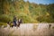 On a sunny day, the girl takes a ride on horseback through the expanses of her estate