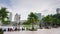 Sunny day KLCC mall fountain park city panorama 4k time lapse kuala lumpur malaisia