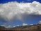Sunny day with large cloud in the Santa Catalina mountains in Tucson, Arizona