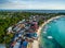 Sunny Day in Malapascua Island in Visayan Sea, One of Cebu Island. Sea water and Boats. Bounty Beach with Local Architecture