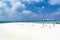 Sunny day in Maldives with blue sky and turquoise water in the backdrop