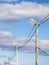 Sunny day street lighting lamppost wires sky clouds vertical