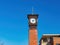 Sunny exteior view of the clock tower of Oklahoma State University