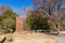 Sunny exteior view of the sign of Oklahoma State University