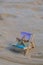 Sunny holidays on the beach with sand beach accessories with sea shells and sea star. Sun lounger stand sea Ocean