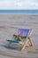 Sunny holidays on the beach with sand beach accessories with sea shells and sea star. Sun lounger stand sea Ocean