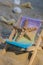 Sunny holidays on the beach with sand beach accessories with sea shells and sea star. Sun lounger stand sea Ocean