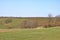 Sunny idyllic rural landscape with fields and meadows in Germany