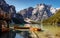 Sunny morning at Famouse Mountain Lake in dolomites Alps. Wonderful Braies Lake during sunrise. Amazing Summer Mountain