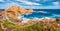 Sunny morning view of Pietra cape with Phare de la Pietra lighthouse on background. Colorful summer scene of Corsica island, Franc