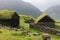 Sunny morning view of typical turf-top houses. Panoramic summer scene of Streymoy island, Denmark, Europe.Torshavn Faroe Islands