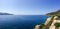 Sunny panoramic ocean and shoreline