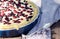 Sunny Photo with a morning breakfast in rustic style. Cheesecake raspberries and blueberries on wooden table.