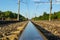 Sunny railway with reflection