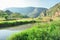 Sunny river and mountains