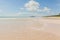 Sunny seaside scenery, fine white sand, blue sky and white clouds