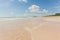 Sunny seaside scenery, fine white sand, blue sky and white clouds