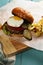 Sunny side up burger on a wooden tabletop