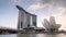 Sunny sky marina bay sands hotel helix bridge art science museum 4k time lapse singapore