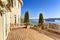 Sunny spacious walkout deck of luxurious waterfront home