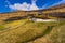 Sunny spring view of Saksun village with typical turf-top houses, Faroe Islands