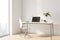 Sunny stylish work place in home office area with light wooden chair and table and city view from big window